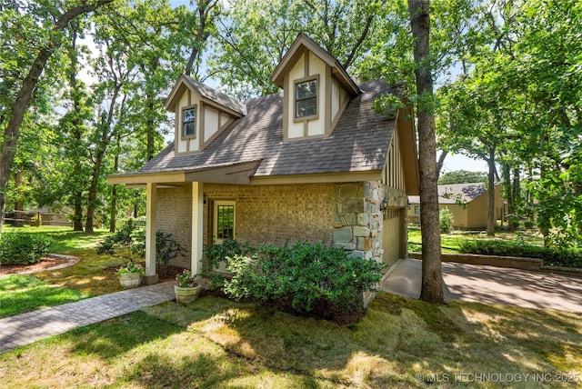 6530 E 106th St, Tulsa, OK 74133 - view of front facade featuring brick siding, stone siding, a front lawn, a garage, and roof with shingles