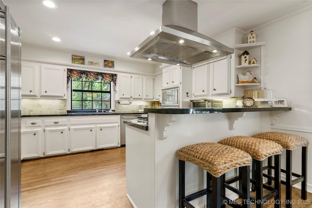 6530 E 106th St, Tulsa, OK 74133 - kitchen featuring island exhaust hood, open shelves, white cabinets, dark countertops, and recessed lighting