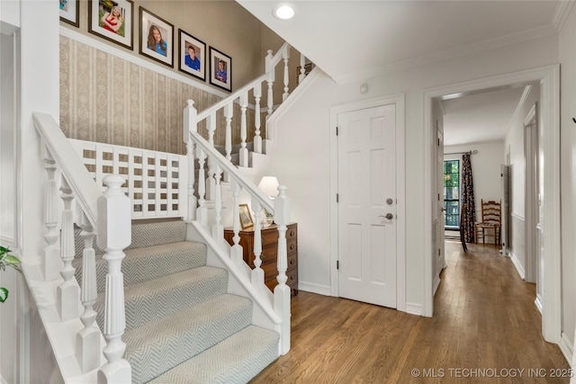 6530 E 106th St, Tulsa, OK 74133 - stairway featuring wood finished floors and crown molding