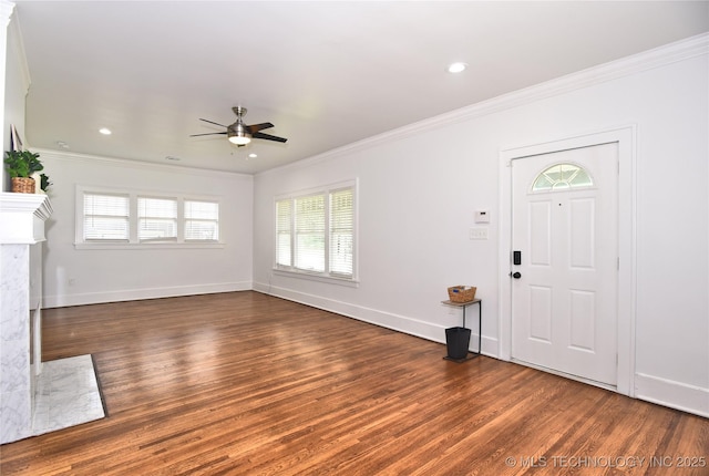 2020 E 14th St, Tulsa, OK 74104 - entryway featuring ceiling fan, wood finished floors, crown molding, healthy amount of natural light, and recessed lighting