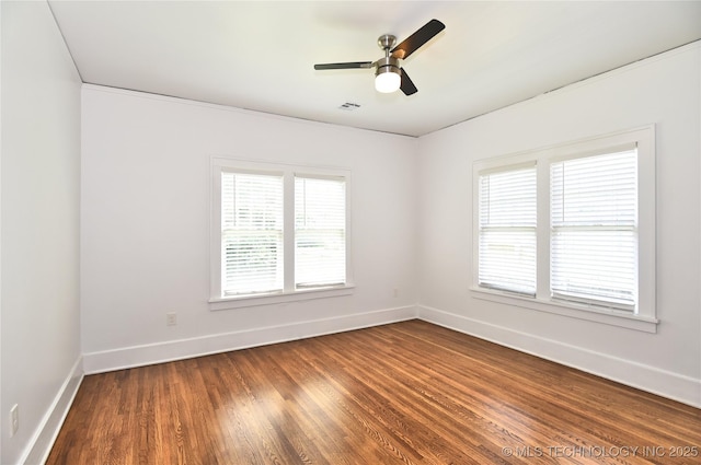 2020 E 14th St, Tulsa, OK 74104 - unfurnished room featuring dark wood finished floors and ceiling fan