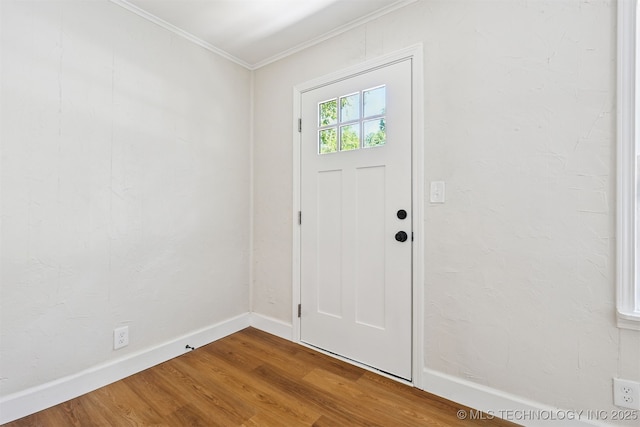 202 W Burnham Ave, Sapulpa, OK 74066 - foyer entrance featuring wood finished floors and ornamental molding