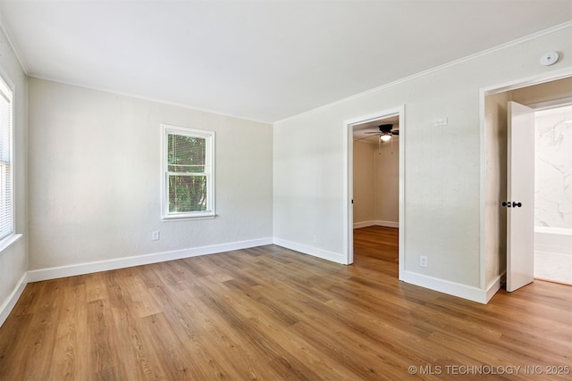 202 W Burnham Ave, Sapulpa, OK 74066 - spare room featuring ornamental molding, a smoke detector, light wood finished floors, and a ceiling fan