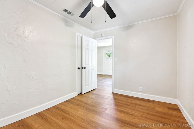 202 W Burnham Ave, Sapulpa, OK 74066 - spare room featuring crown molding, ceiling fan, and light wood-style flooring