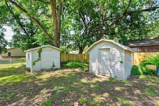 202 W Burnham Ave, Sapulpa, OK 74066 - view of shed with a fenced backyard
