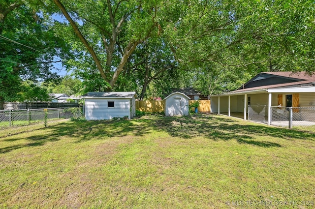 202 W Burnham Ave, Sapulpa, OK 74066 - fenced backyard with a storage shed
