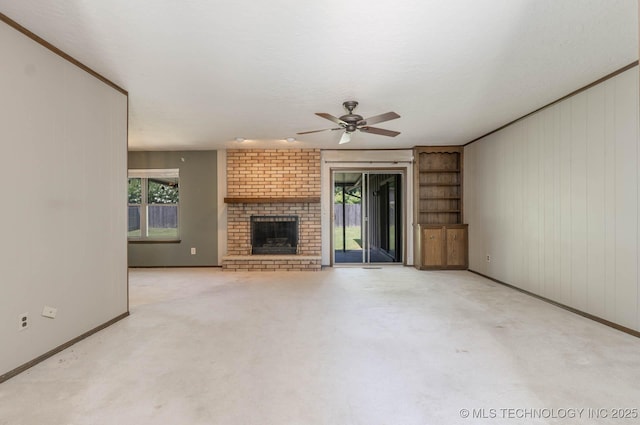 606 N Gum St, Jenks, OK 74037 - unfurnished living room with a ceiling fan, a fireplace, and carpet flooring