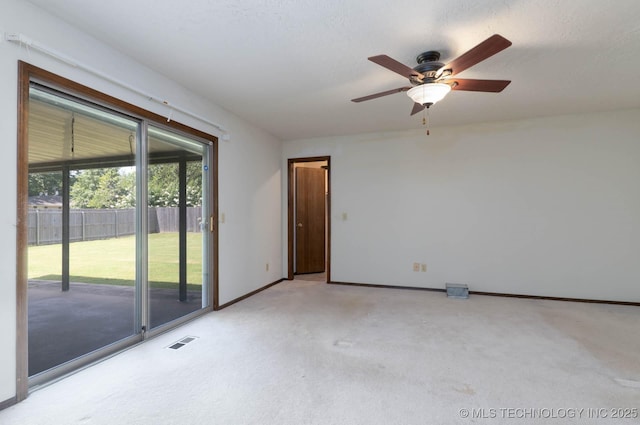 606 N Gum St, Jenks, OK 74037 - empty room with light colored carpet and a ceiling fan