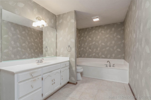 606 N Gum St, Jenks, OK 74037 - bathroom with wallpapered walls, a bath, vanity, and tile patterned floors