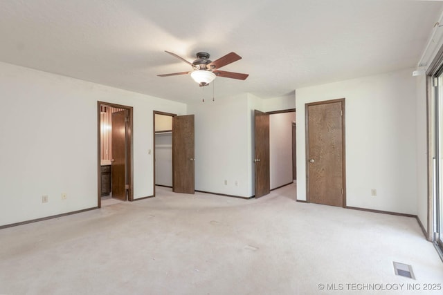 606 N Gum St, Jenks, OK 74037 - unfurnished bedroom featuring light colored carpet, ensuite bathroom, and ceiling fan