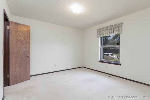 606 N Gum St, Jenks, OK 74037 - unfurnished room with light carpet and baseboards