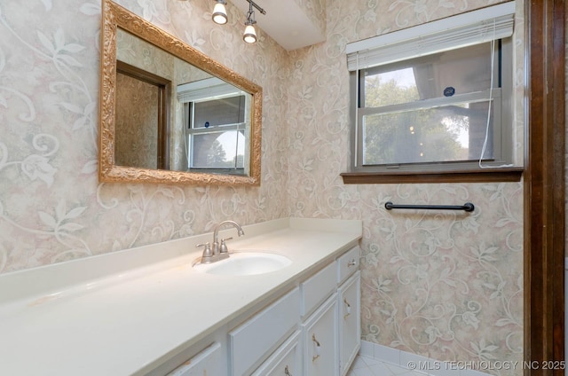 606 N Gum St, Jenks, OK 74037 - bathroom with wallpapered walls, vanity, and tile patterned floors