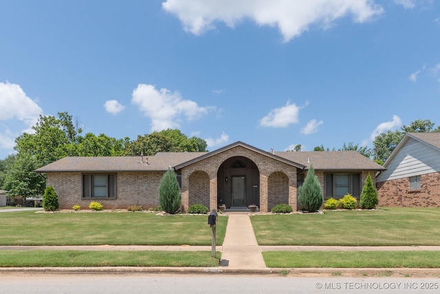 606 N Gum St, Jenks, OK 74037 - ranch-style house with brick siding and a front lawn