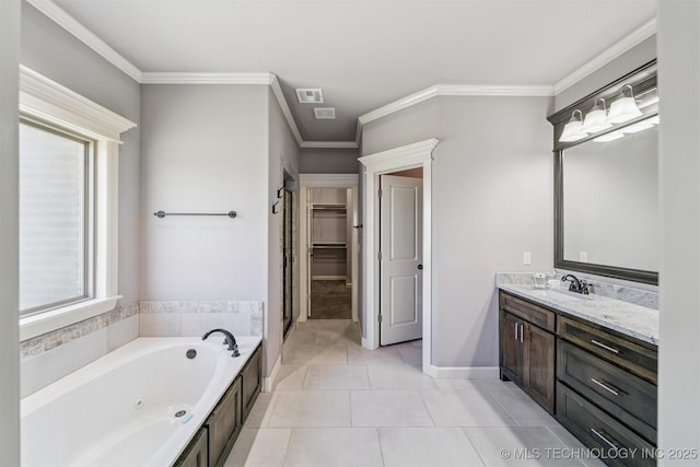 6107 E 127th St N, Collinsville, OK 74021 - full bathroom with vanity, a jetted tub, tile patterned flooring, ornamental molding, and a walk in closet
