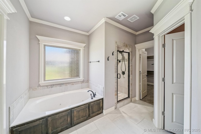 6107 E 127th St N, Collinsville, OK 74021 - full bath featuring a shower stall, a jetted tub, crown molding, and a walk in closet
