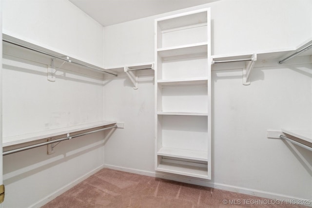 1701 N Skinner Ave, Drumright, OK 74030 - walk in closet featuring carpet
