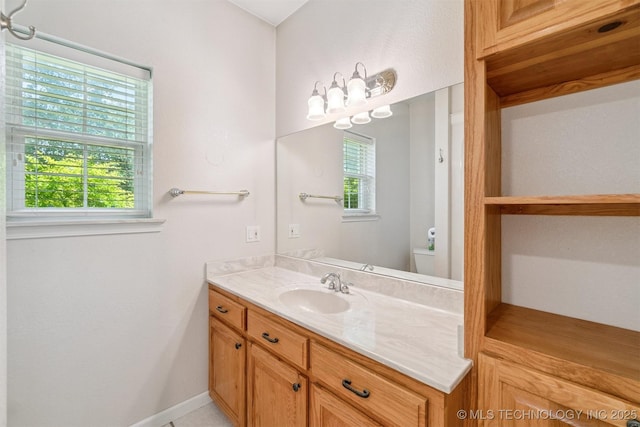 1701 N Skinner Ave, Drumright, OK 74030 - bathroom featuring vanity and plenty of natural light