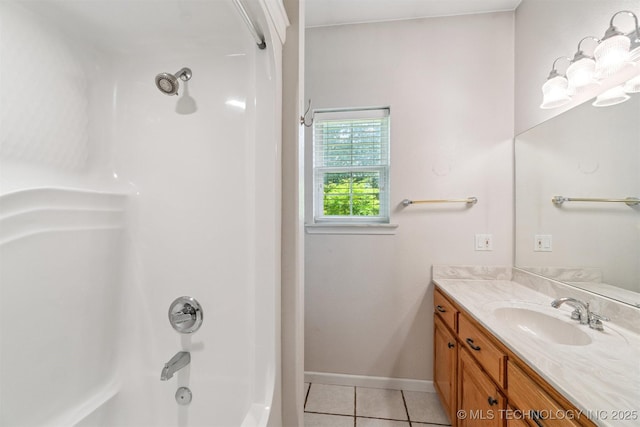 1701 N Skinner Ave, Drumright, OK 74030 - bathroom featuring tile patterned floors, vanity, and tub / shower combination