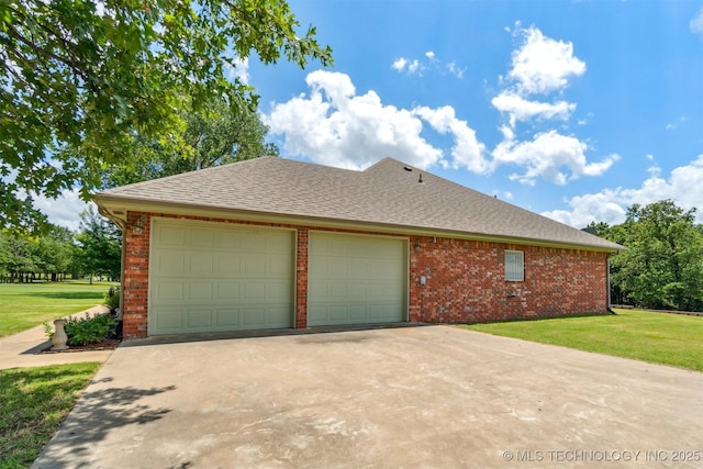 1701 N Skinner Ave, Drumright, OK 74030 - view of property exterior with concrete driveway, a garage, brick siding, a yard, and roof with shingles