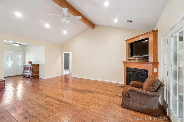 1701 N Skinner Ave, Drumright, OK 74030 - living area with a fireplace with flush hearth, light wood-style flooring, ceiling fan, and recessed lighting