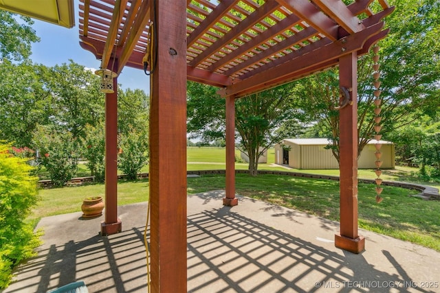 1701 N Skinner Ave, Drumright, OK 74030 - view of patio / terrace featuring a pergola and an outdoor structure