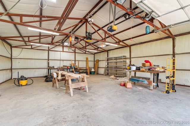 1701 N Skinner Ave, Drumright, OK 74030 - garage featuring a garage door opener and metal wall