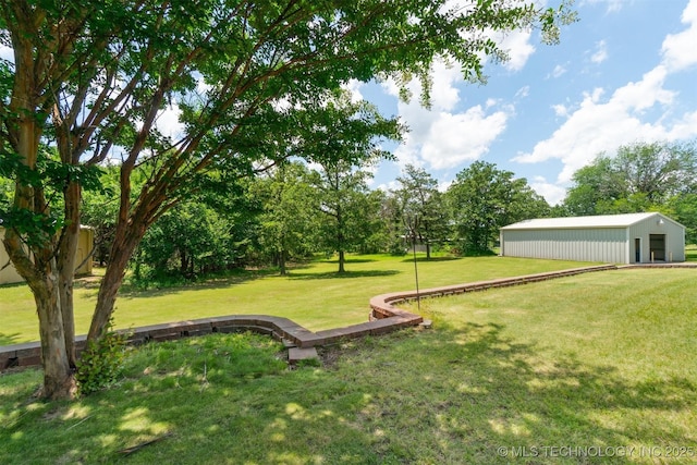1701 N Skinner Ave, Drumright, OK 74030 - view of grassy yard featuring an outbuilding and an outdoor structure