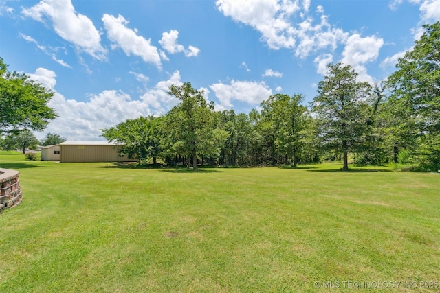 1701 N Skinner Ave, Drumright, OK 74030 - view of grassy yard with an outbuilding