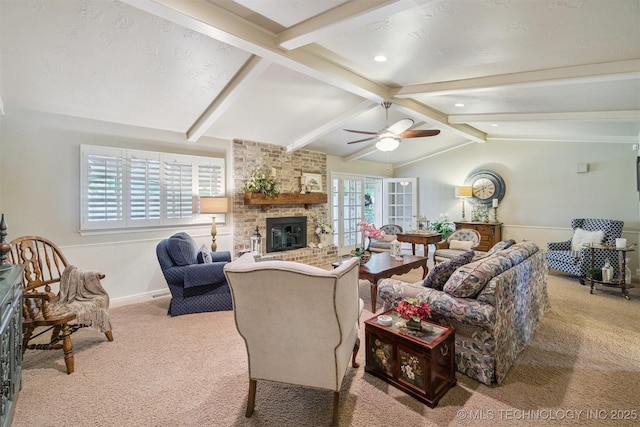 1605 N Skinner Ave, Drumright, OK 74030 - carpeted living room with a brick fireplace, ceiling fan, and recessed lighting
