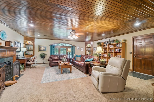 1605 N Skinner Ave, Drumright, OK 74030 - carpeted living room with wood ceiling, a fireplace, ceiling fan, crown molding, and recessed lighting