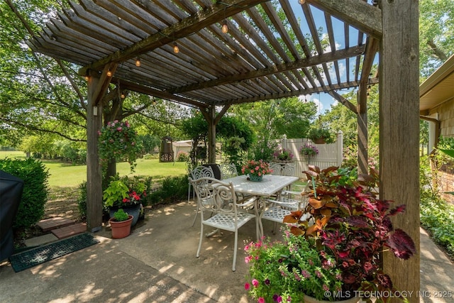 1605 N Skinner Ave, Drumright, OK 74030 - view of patio featuring a pergola and outdoor dining space
