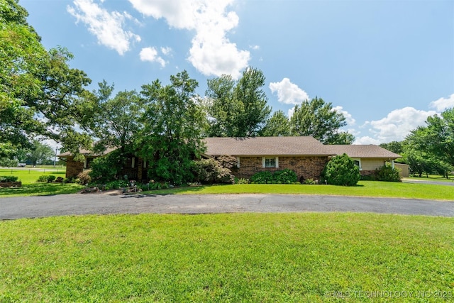 1605 N Skinner Ave, Drumright, OK 74030 - single story home with a front yard