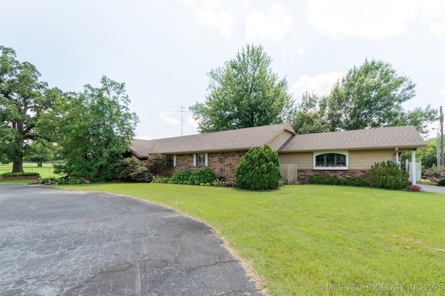 1605 N Skinner Ave, Drumright, OK 74030 - single story home with a front yard