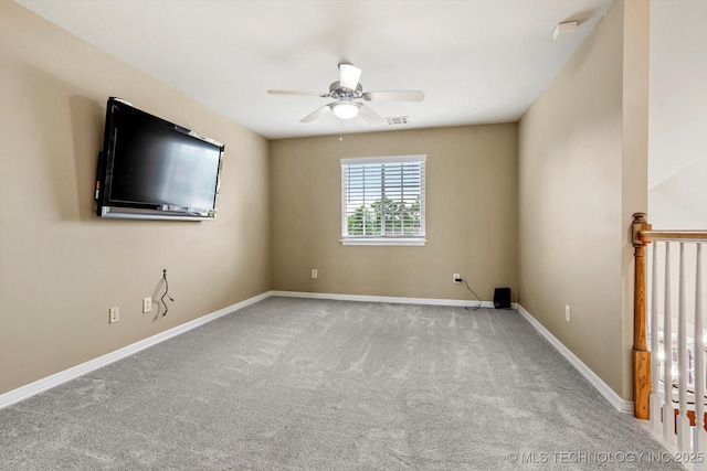 4207 S 69th W Ave, Tulsa, OK 74107 - empty room featuring carpet floors and a ceiling fan
