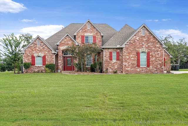 4207 S 69th W Ave, Tulsa, OK 74107 - craftsman inspired home with roof with shingles, brick siding, and a front yard