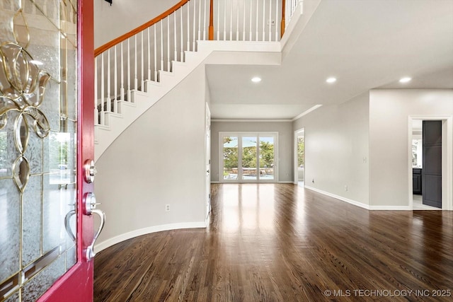 4207 S 69th W Ave, Tulsa, OK 74107 - entryway with wood finished floors, recessed lighting, stairway, and crown molding