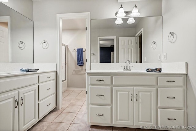 4207 S 69th W Ave, Tulsa, OK 74107 - bathroom featuring vanity, bathtub / shower combination, and tile patterned floors