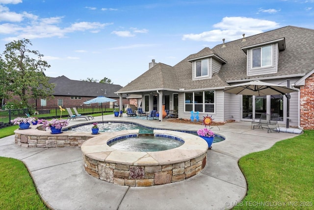 4207 S 69th W Ave, Tulsa, OK 74107 - view of swimming pool with a fenced backyard, a patio, and a pool with connected hot tub