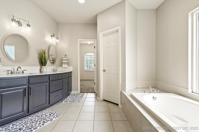 4207 S 69th W Ave, Tulsa, OK 74107 - full bathroom featuring double vanity, a bath, and tile patterned floors