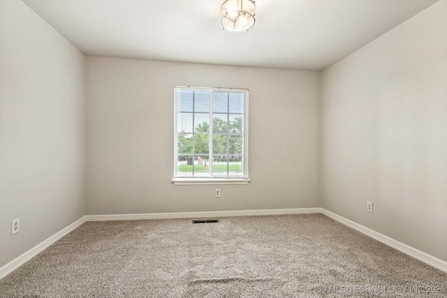 4207 S 69th W Ave, Tulsa, OK 74107 - carpeted empty room with baseboards
