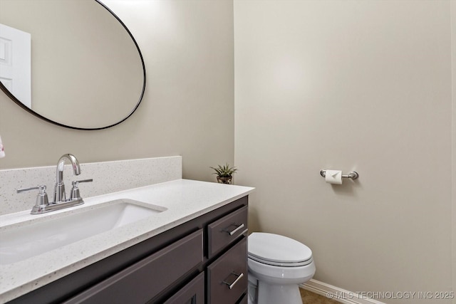 4207 S 69th W Ave, Tulsa, OK 74107 - half bathroom featuring toilet and vanity