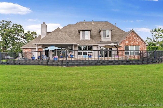 4207 S 69th W Ave, Tulsa, OK 74107 - rear view of house with brick siding, roof with shingles, and a chimney