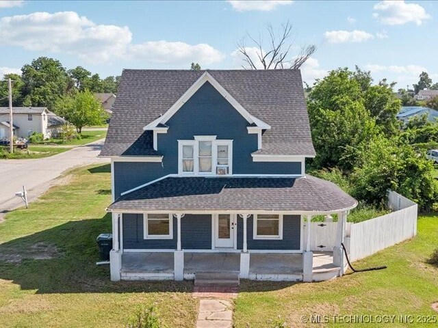 402 E Patti Page Blvd, Claremore, OK 74017 - view of front of property featuring roof with shingles and covered porch
