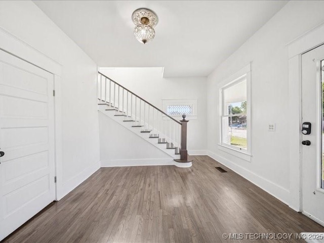 402 E Patti Page Blvd, Claremore, OK 74017 - foyer with stairs and wood finished floors