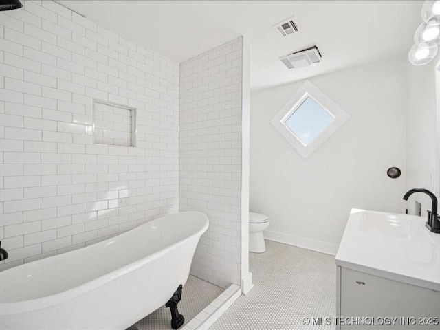 402 E Patti Page Blvd, Claremore, OK 74017 - full bathroom with a freestanding tub, vanity, and tile patterned flooring