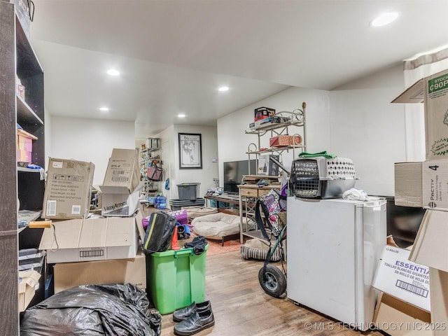 6330 Norman Ave, Oklahoma City, OK 73122 - below grade area featuring wood finished floors and recessed lighting