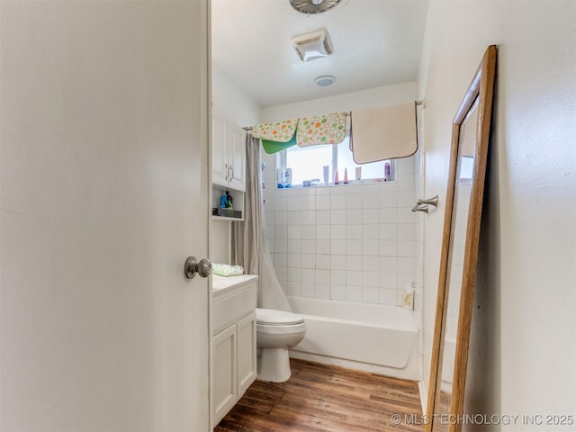 6330 Norman Ave, Oklahoma City, OK 73122 - bathroom featuring shower / bath combination with curtain, wood finished floors, and vanity