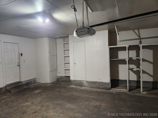 1669 S Pine Ave W, Broken Arrow, OK 74012 - garage with a garage door opener