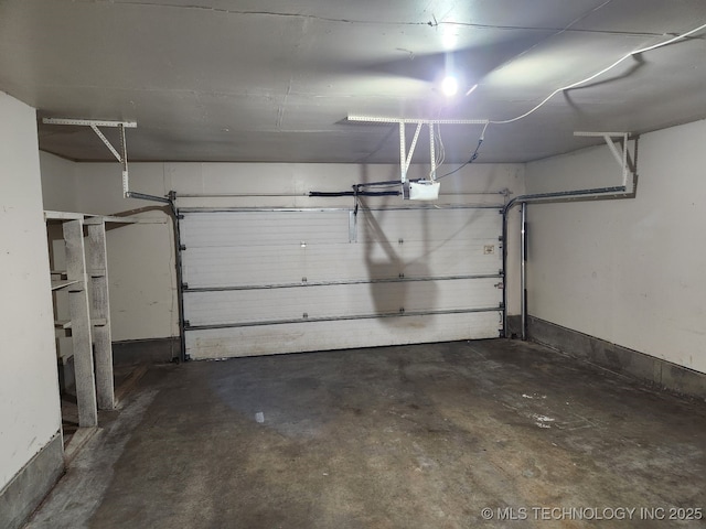1669 S Pine Ave W, Broken Arrow, OK 74012 - garage featuring a garage door opener
