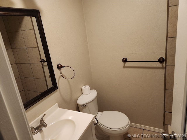 1669 S Pine Ave W, Broken Arrow, OK 74012 - bathroom featuring tile patterned floors and vanity